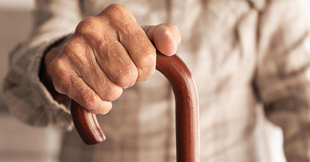 Senior man with cane